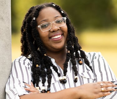 a mental health therapist in Indiana with a large smile on her face