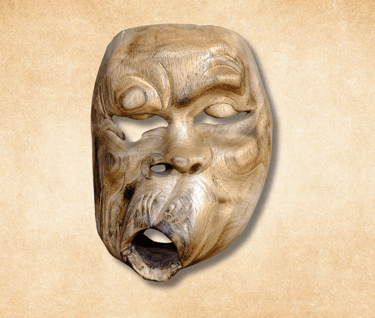 a wooden decoration of mask