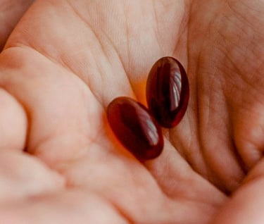 Cupped hands holding medicine pills