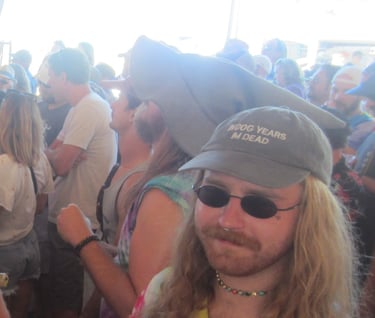 standing in the crowd at a music festival