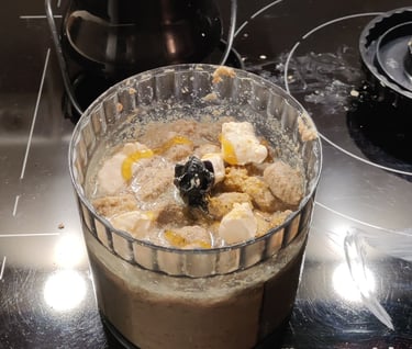 a bowl of food on a stove top