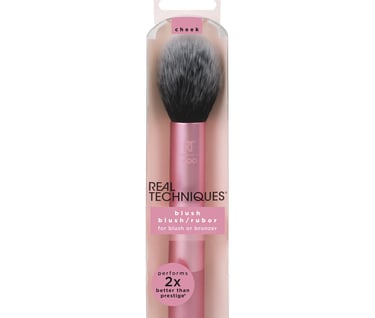 a pink makeup brush with a brush and a brush