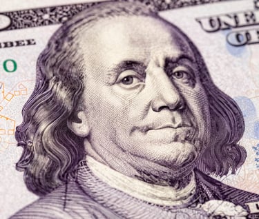 A textured macro photograph showing the intricate, fine-line engraving patterns of high-quality paper currency on a soft white background, accented with subtle deep plum ink details.