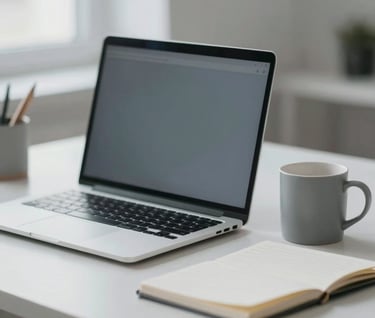 Detail of a minimalist workspace. A laptop, a simple mug, and a notebook in an organized, elegant arrangement. Contemporary style with #9A9E96 color accents and cinematic depth of field.