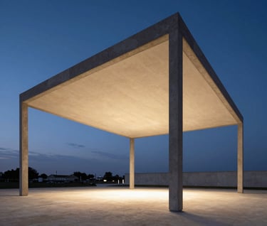 Architectural photography of a modern pavilion at dusk in Portugal. Warm off-white light glowing from inside charcoal structural frames against a deep slate blue sky.