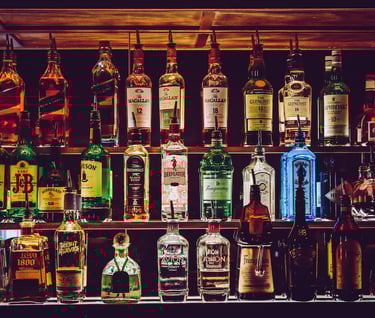 a bunch of bottles of alcohol and liquor