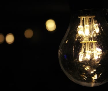 a light bulb hanging from a light bulb on a string light