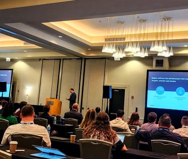 corporate event with two big screens, speakers and podium