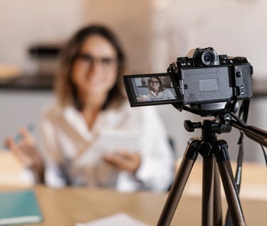 a woman is taking a picture of herself in a camera