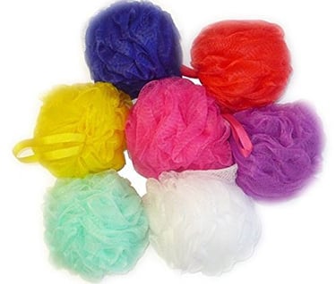 a bunch of colored balls of soap on a white background