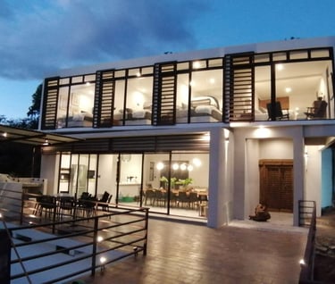 a house with a balcony and a balcony