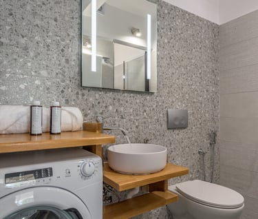 a bathroom with a washer 