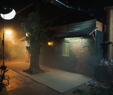 Street-style bar exterior set at Grayfox Studios with realistic façade and sidewalk atmosphere