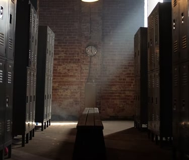Locker room set at Grayfox Studios with benches, lockers, and sports-inspired atmosphere