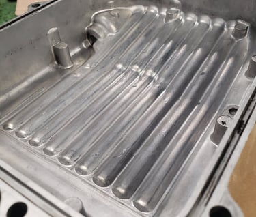 Honda CB oil pan after getting cleaned and vapor blasted. 