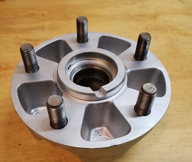 Wheel hubs after vapor blasting. Our vaporhone service will make your restoration look new again.