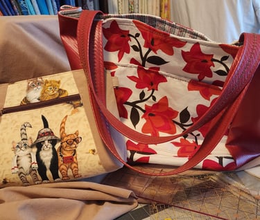 a purse bag with a cat on it