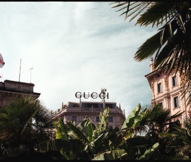 a large building with a large sign that says gucci