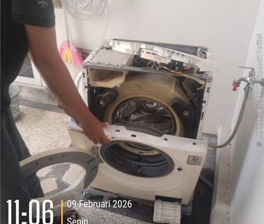 perbaikan mesin cuci front loading di Pekanbaru