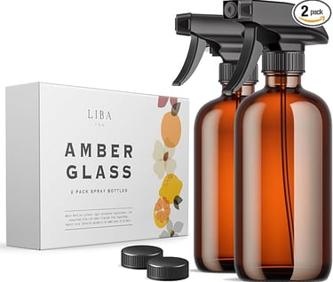 a glass bottle of amber glass cleaner