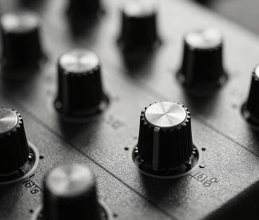 A macro close-up photograph of a vintage analog synthesizer's patch cables and metallic dials. Shallow depth of field, sharp focus on a single silver dial, elegant black and white studio lighting, North American context.