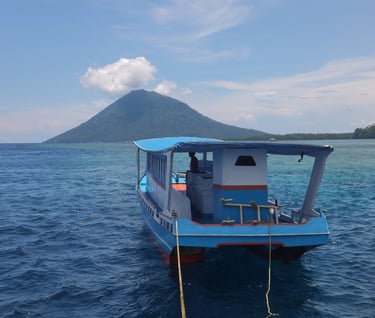 dive boats of Bunaken Island Marine Park, North Sulawesi, Indonesia