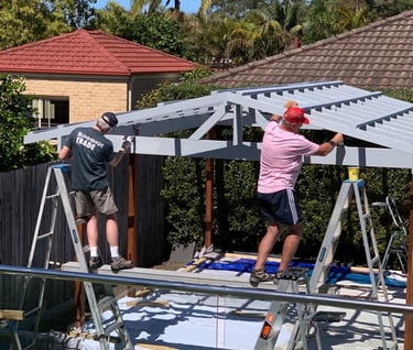 men working on a new pergola 