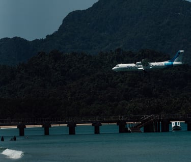 a plane taking off from a beach