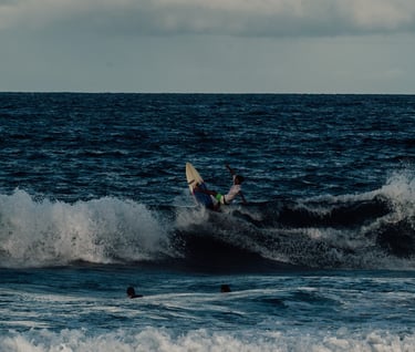 a person surfing on a wave in the ocean
