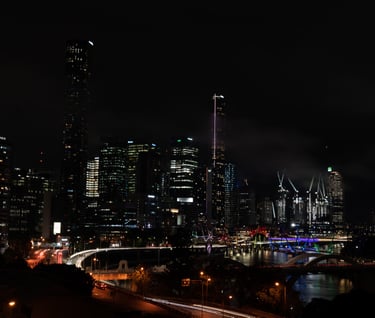 a city skyline with a bridge and a city skyline
