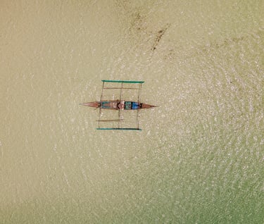 a boat is sitting in the water