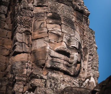 a stone face on a stone face of a face