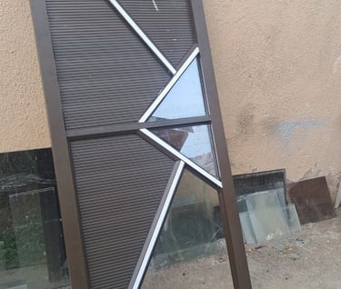 Aluminium door being adjusted and resized for correct fitting
