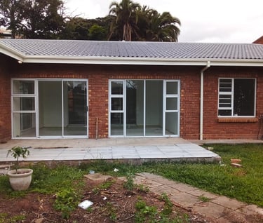 White aluminium sliding doors and windows done in Amanzimtoti