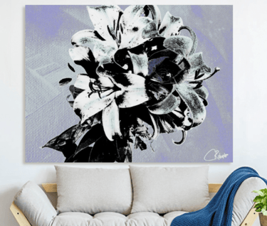 Canvas Print with a Bouquet of silver Lilies on it wth a couch underneath this 