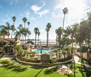 Oceanfront pool and gardens at Harbor View Inn in Santa Barbara, California, perfect for a romantic couples getaway