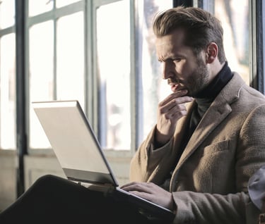 man using laptop