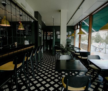 a restaurant with a checkered floor and a checkered floor