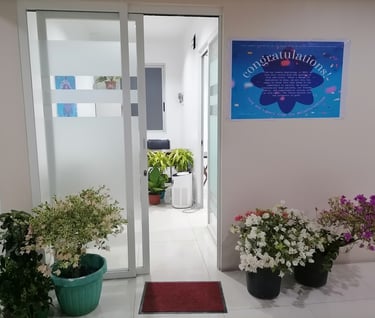 a door way with flowers in a room
