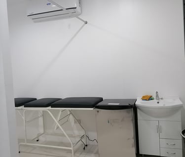 a room with a table and a sink