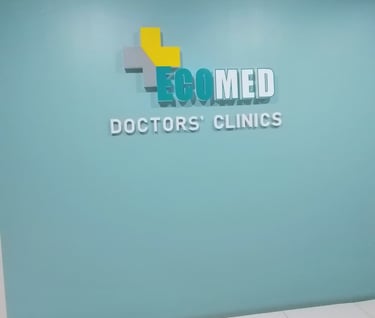 a doctor's office with a large sign that says ebomed doctors