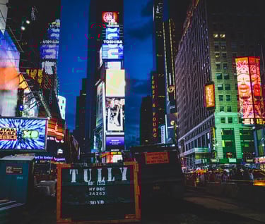 a city street scene with a billboard showing a billboard for a movie