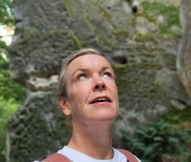 a woman hiking in the mountains