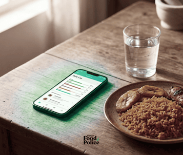  Free AI tools for healthy eating: a phone with a food tracking app beside a Nigerian meal of rice