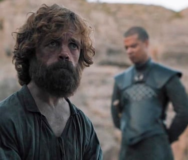 Tyrion Lannister standing in front of the council