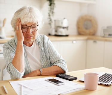 a senior woman worried about medical bills
