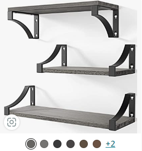 a set of three shelves with shelves and shelves