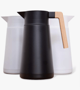 a black and white coffee pot with a wooden handle