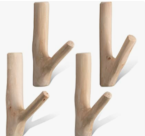 a set of four wooden pegs with a wooden handle