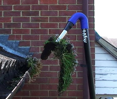 Gutter Cleaning vacuum removing gutter debris C Thru Window Cleaning Services, Exeter